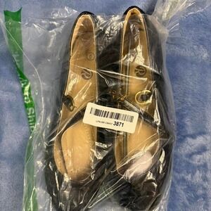 Black leather ballet flats with gold buckle detail size 6
